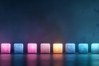 Colorful translucent glass cubes arranged in row on reflective surface with gradient lighting from purple to blue creating modern minimalist composition.