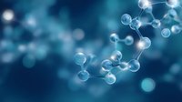 Glowing molecular structure on dark blue background with bokeh effect shows scientific concept of chemistry, biology and medical research.