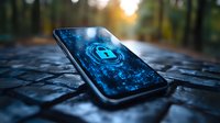 Glowing blue digital padlock on smartphone screen against dark forest background showcases mobile security and data protection concept in modern technology.