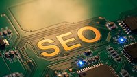 SEO text on green circuit board with golden letters and electronic components for digital marketing and search engine optimization concepts.