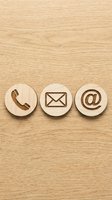 Wooden contact icons with phone, envelope, and email symbols on natural wood background for business communication and customer service.