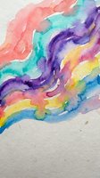 Vibrant watercolor abstract with swirling rainbow waves in pink, teal, purple, yellow and blue on textured paper background.