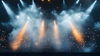 Dramatic stage lighting with orange and blue spotlights piercing through atmospheric fog and smoke effects, creating magical concert ambiance with floating particles.