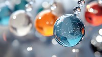 Colorful glass spheres with water droplets hanging in soft focus, creating dreamy bokeh effect for festive or decorative backgrounds.