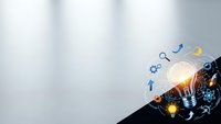 Businessman hand holding glowing light bulb with digital innovation icons and gears representing creative business solutions and technology concepts.