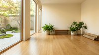 Modern minimalist interior with wooden floors, large windows overlooking zen garden, natural light, indoor plants, warm beige walls, contemporary home design.