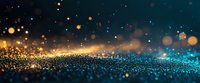Magical gold and turquoise glitter background with bokeh effect and sparkling particles. Defocused abstract festive backdrop with blurred lights and sparkles.