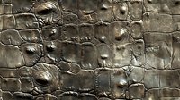 Metallic textured surface with embossed crocodile skin pattern featuring intricate scales, bumps and ridges in dark bronze tones. Luxury material background.