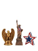 Patriotic American symbols including golden eagle statue, Statue of Liberty replica with flag, and red white blue star isolated on white background for design projects.
