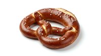 Freshly baked pretzel with golden-brown crust and coarse salt crystals, isolated on white background for bakery, food packaging, and menu design use.