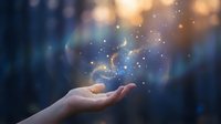 Open palm holding glowing magical particles and light effects against blurred bokeh background for spiritual and fantasy concepts.