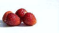 Fresh ripe strawberries isolated on white background for healthy eating, cooking recipes, desserts and organic fruit concepts.