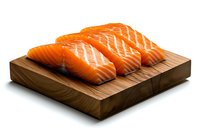 Fresh raw salmon fillets with visible marbling arranged on wooden cutting board against white background, isolated food photography for culinary and menu design.