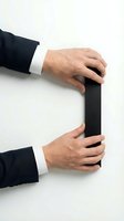 Businessman hands holding black rectangular object on white background, professional corporate concept for business presentations and marketing materials.