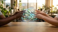 Diverse hands protecting glowing digital network sphere symbolizing teamwork, collaboration and technology connection in modern office environment.