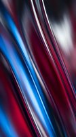 Abstract diagonal stripes with motion blur in blue, red, and white tones. Modern flowing lines create dynamic energy suitable for backgrounds, web design, and contemporary graphics.