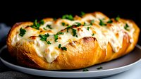 Cheesy garlic bread with melted mozzarella and fresh herbs on dark plate, comfort food appetizer for restaurant menu and culinary content.