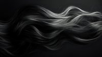 Flowing strands of silver-white hair create elegant waves and curves against dark background, showcasing natural movement and luxurious texture in monochrome style.