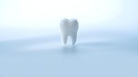 White tooth model floating on clean minimalist background for dental care and oral health concepts in medical presentations.