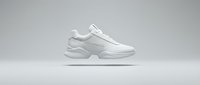 White athletic sneaker with chunky sole isolated on neutral background, suitable for footwear marketing and design projects.