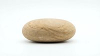 Smooth oval river stone isolated on white background, natural beige pebble with subtle texture, perfect for nature, zen, and spa design projects.