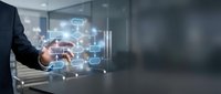 Businessman in dark suit holding smartphone with glowing digital network nodes and connection lines floating above screen, representing data communication and business technology solutions.