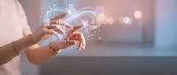 Young woman hands holding glowing digital infinity symbol with floating data icons, representing innovation, technology and future connectivity concept.