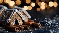Festive gingerbread house with cinnamon sticks on dark background, decorated with white icing and illuminated by warm golden bokeh lights, creating magical holiday atmosphere.