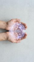 Hands holding glowing digital globe with internal consistency text overlay, representing global business standards, quality assurance, and unified corporate values.