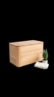 Wooden storage chest with lid, small potted evergreen plant and folded linen towel, isolated on transparent background, ready for stickers and print on demand.