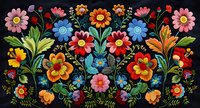 Colorful blooms and leaves on black background, featuring red, pink, blue, and orange flowers in symmetrical arrangement.