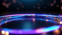 Futuristic curved light trails with neon blue and purple colors against dark background create dynamic motion effect, perfect for technology concepts.
