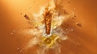 Golden explosion with dynamic powder burst and particles scattered against warm orange background for creative design projects.