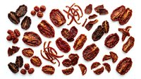 Cacao pods and cocoa beans isolated on white background, raw ingredients for chocolate production and confectionery manufacturing.