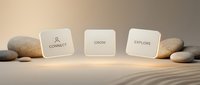 Connect, grow, explore concept displayed on three white rounded square blocks surrounded by smooth stones on sand, symbolizing business strategy and personal development.