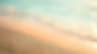 Soft, blurred sky with warm peachy and golden tones blending into cool blue hues, creating a serene, dreamy atmosphere suitable for backgrounds and overlays.