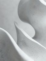 Minimalist black and white macro photography of smooth curved shapes creating abstract composition with light and shadow play, artistic fine art photography.
