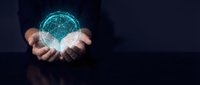 Businessman holding glowing digital globe with network connections, representing global technology, internet connectivity, and worldwide business communication.