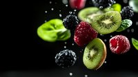 Fresh berries and kiwi slices floating with water drops on dark background, dramatic food photography for healthy eating and juice advertising.
