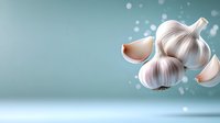 Fresh whole garlic bulb and cloves floating in soft blue background with bokeh effect, culinary concept for cooking and healthy eating lifestyle.