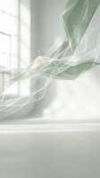 Flowing green and white translucent fabric or curtain material floating gracefully in bright sunlit room with window light creating ethereal atmosphere.