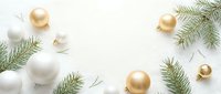 Golden and white ornaments with evergreen branches arranged on neutral background, suitable for holiday greeting cards, seasonal marketing materials, and festive design projects.