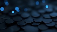 Abstract dark metallic circles with blue bokeh lights creating modern technological pattern, macro photography with selective focus and depth of field.