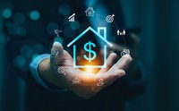 Businessman holding glowing house with dollar sign surrounded by financial and real estate icons representing property investment and mortgage concepts.
