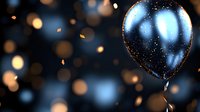 Shiny black balloon with metallic glitter floating on dark background with golden bokeh lights creating festive atmosphere for celebration and party decoration.