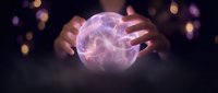 Hands holding glowing purple energy sphere with mystical light effects and bokeh background for spiritual healing and magic concepts.
