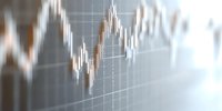 Financial market data visualization with candlestick chart showing price movements and trading patterns for investment analysis and economic forecasting.