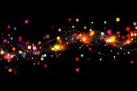 Glowing colorful dots and flowing light trails create dynamic wave pattern against black background, abstract festive design for holiday decorations and celebrations.