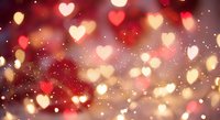 Romantic bokeh background with glowing heart shapes and warm lights creating dreamy atmosphere for Valentine's Day celebrations and love-themed designs.