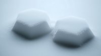 Two minimalist ice cubes in soft focus casting gentle shadows on light surface, creating serene atmospheric composition for beverage and cooling concepts.